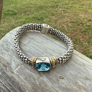Elegant Silver and Gold Bracelet with Blue Gemstone